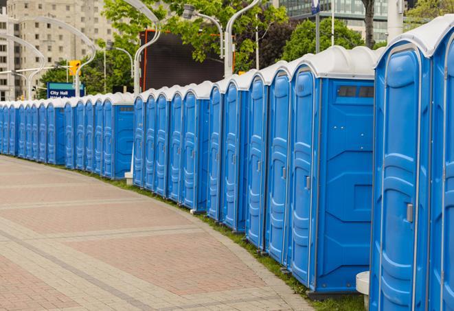 a row of portable restrooms at a fairground, offering visitors a clean and hassle-free experience in woodrow